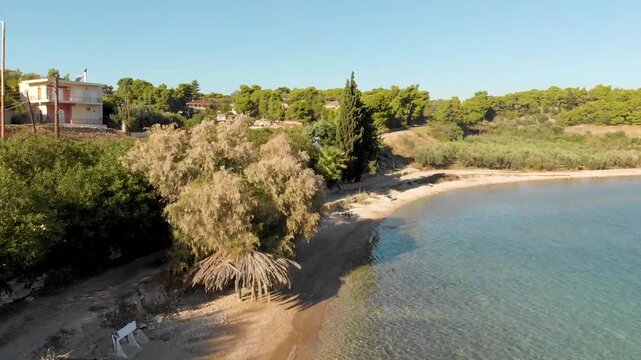 Aerial view of Beach Paralia Kechrion near Corinth Canal, Greece. Drone view from above. Summer holidays destination
