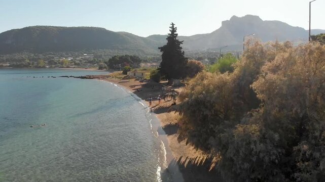 Aerial view of Beach Paralia Kechrion near Corinth Canal, Greece. Drone view from above. Summer holidays destination
