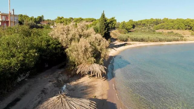 Aerial view of Beach Paralia Kechrion near Corinth Canal, Greece. Drone view from above. Summer holidays destination
