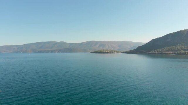 Aerial view of Beach Paralia Kechrion near Corinth Canal, Greece. Drone view from above. Summer holidays destination
