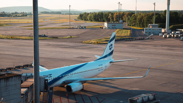 Zurich, Switzerland - May 29, 2025: View of an aircraft preparing for departure at Zurich Airport during sunset