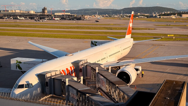 Zurich, Switzerland - May 29, 2025: Airplane at Zurich Airport preparing for departure with busy tarmac and terminal view