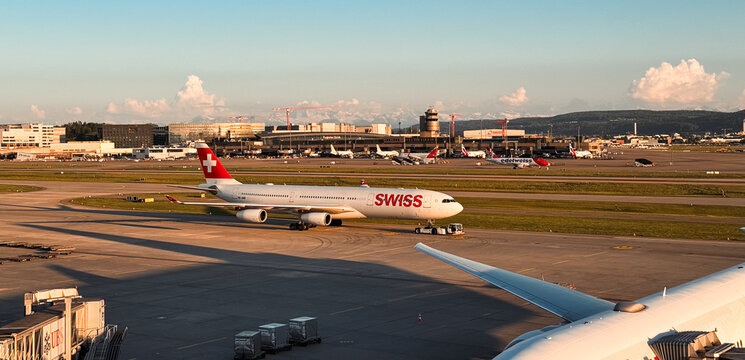 Zurich, Switzerland - May 29, 2025: Swiss airline aircraft prepares for departure at Zurich airport during evening hours