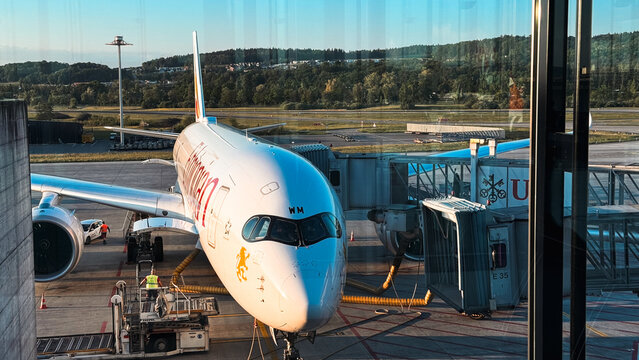 Zurich, Switzerland - May 29, 2025: Airplane preparing for departure at Zurich Airport during evening hours