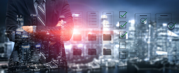 A confident businessman in a suit stands against a modern city backdrop, showcasing digital documents and checkmarks, symbolizing effective project management and business success. Cyphers © InfiniteFlow