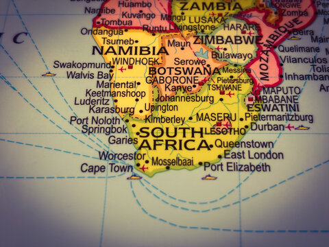 Closeup of a map showing southern africa, including south africa, namibia, botswana, zimbabwe, and mozambique with various cities and towns labeled