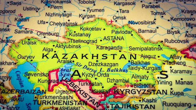 Closeup of a map of kazakhstan and surrounding central asian countries with city names and geographical features visible