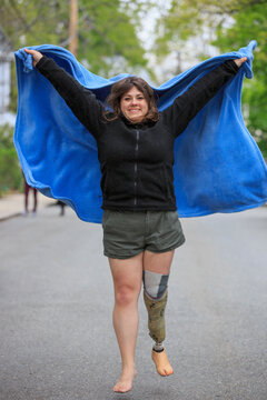 Girl with Presthitic leg in a parade