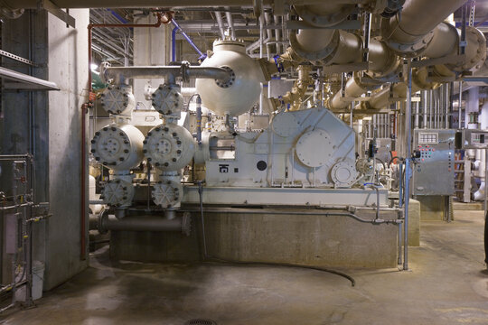 Heavy machinery and control panel in a sewage treatment plant