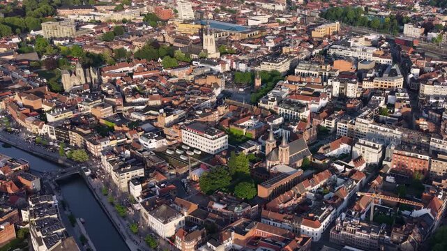 Aerial view beside the old town above the city Kortrijk in Belgium, on a sunny afternoon in early summer.
