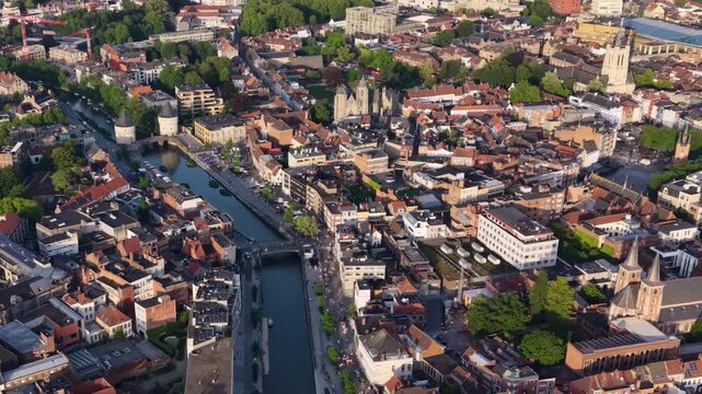 Aerial view beside the old town above the city Kortrijk in Belgium, on a sunny afternoon in early summer.