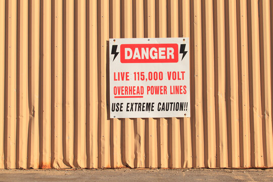 Danger high voltage warning sign at electric plant