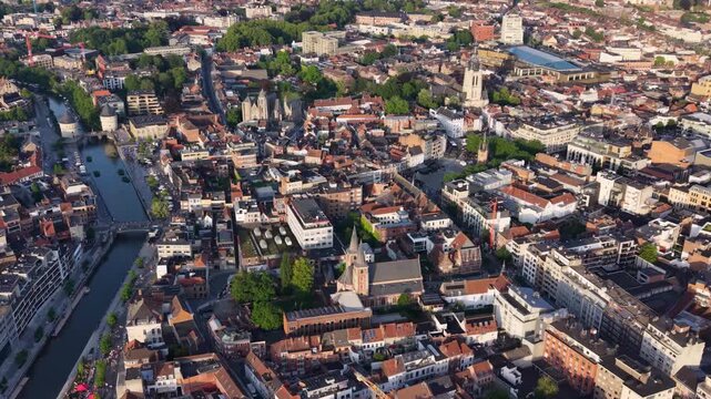 Aerial view beside the old town above the city Kortrijk in Belgium, on a sunny afternoon in early summer.