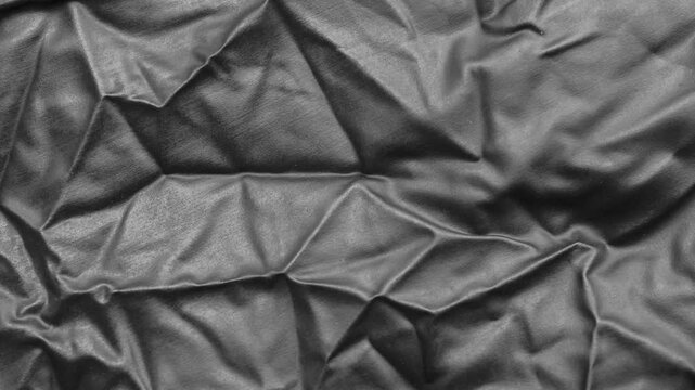Abstract Black Rubber Latex Texture Background with Elegant Folds and Shadows