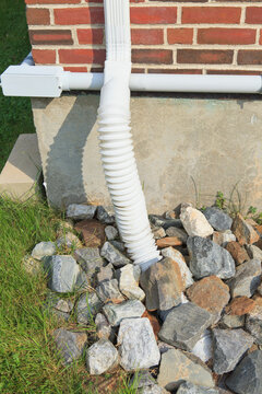 Rain water run-off into rock bed from building