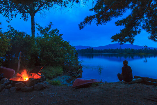 Woman at campsite on Lake Umbagog