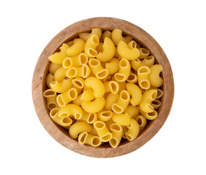 raw chifferi rigati pasta in wooden bowl isolated
