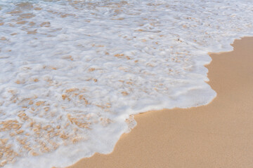 Obraz premium Soft wave on sandy beach. Copy space