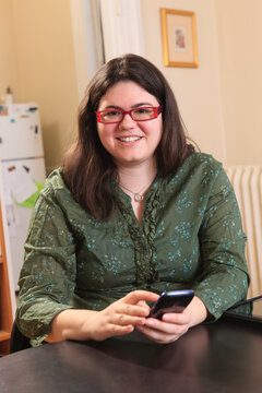 Woman with Asperger syndrome using her smart phone