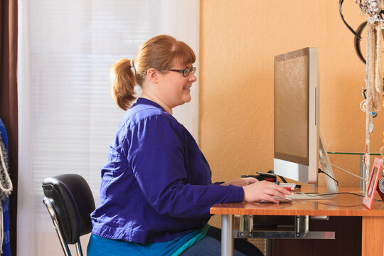 Woman is legally blind using large type on her computer screen