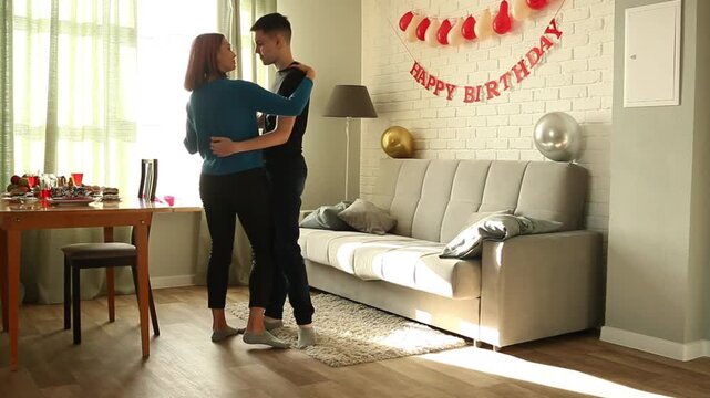 Mother and son dancing slow dance