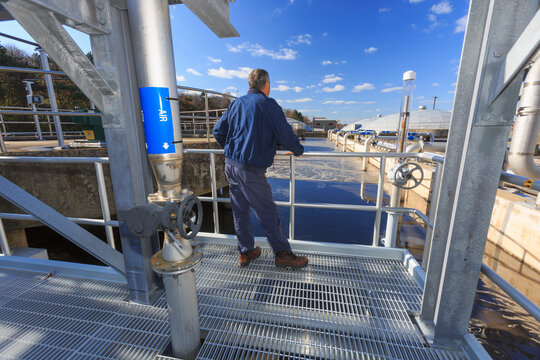 Engineer evaluating water treatment plant operation