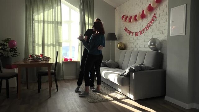 Mother and son dancing slow dance