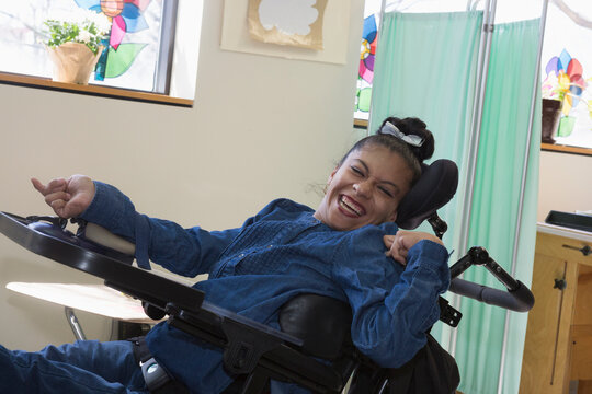 Teen with Spastic Dystonic Cerebral Palsy at school