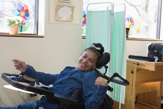 Teen with Spastic Dystonic Cerebral Palsy at school