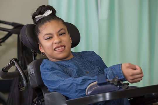 Teen with Spastic Dystonic Cerebral Palsy at school