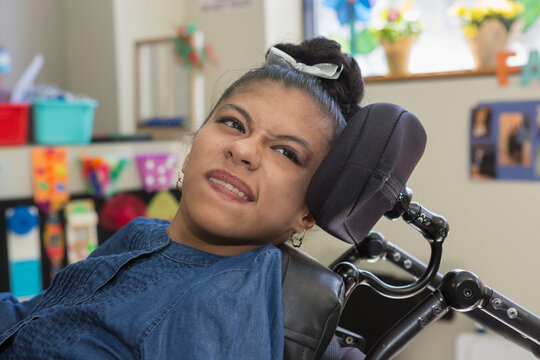 Teen with Spastic Dystonic Cerebral Palsy at school