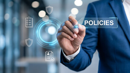 Obraz premium Businessman interacting with digital interface showing policies and corporate compliance icons in a modern office environment
