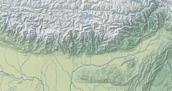 Bhutan on Globe. Zoom into the country with Earth spinning on dark background. Physical world map with Bhutan and label on it. Country view animation.