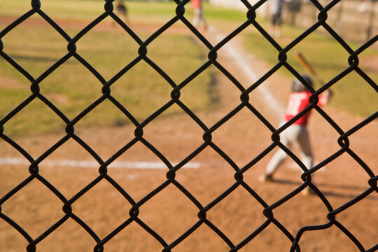 Players playing baseball, Langone Park