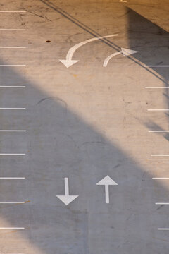 Arrow signs in a parking lot, South Station