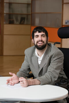 Portrait of a smiling mature with from cerebral palsy
