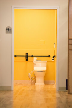 Disabled bathroom through corridor