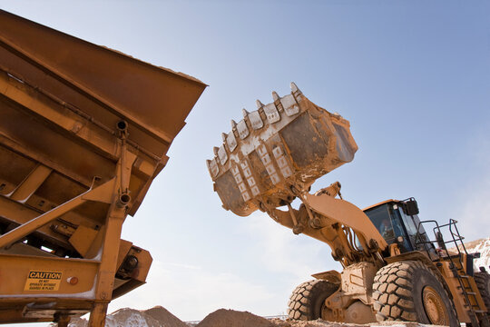 Separator and a front end loader at a construction site