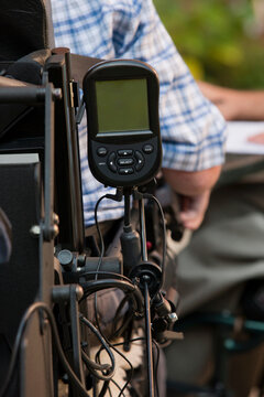 Digital readout for a breathing ventilator on a motorized wheelchair for a man with Duchenne