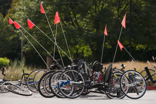 Handcycles and bicycles for adaptive racing on the road