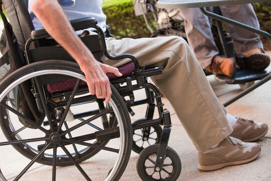 Man with Friedreich's Ataxia sitting in a wheelchair