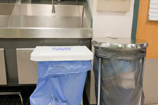 Hospital operating room sink and soiled linen bin