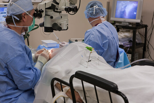 Ophthalmologist performing cataract surgery