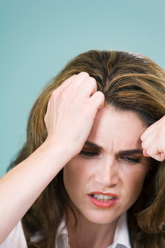 Close-up of a mid adult woman looking depressed - Staged