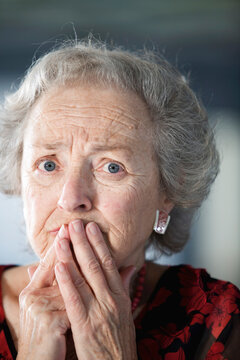 Portrait of a shocked senior woman