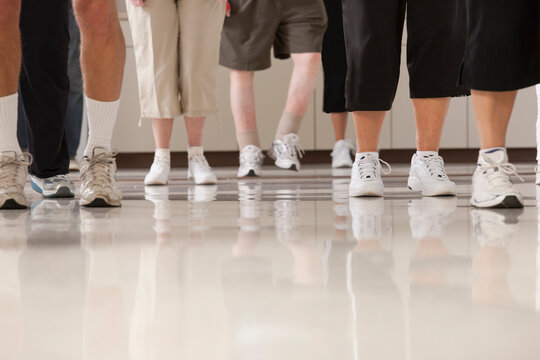 Seniors' exercise class doing cardio