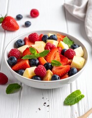 Obraz premium Frischer Obstsalat mit Beeren