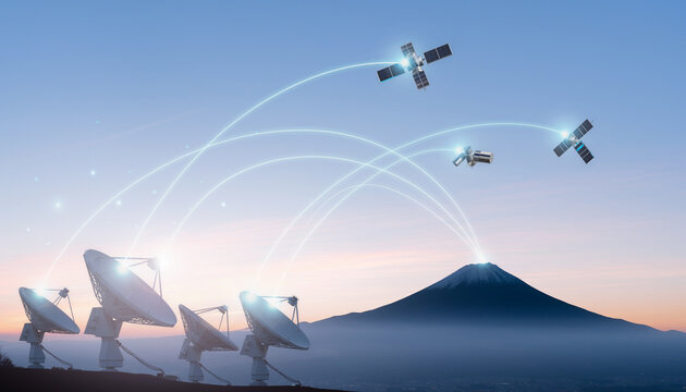 富士山を背景にした衛星通信ネットワークとパラボラアンテナの未来技術イメージ