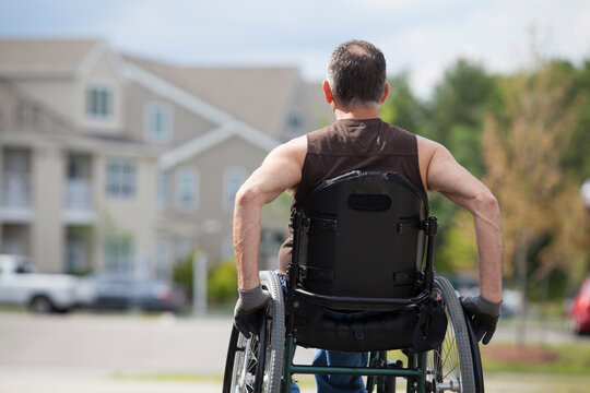 Man with spinal cord injury sitting in a wheelchair