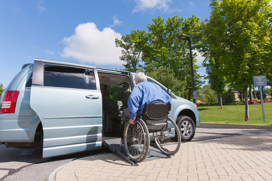Man with muscular dystrophy and diabetes getting in an accessible van
